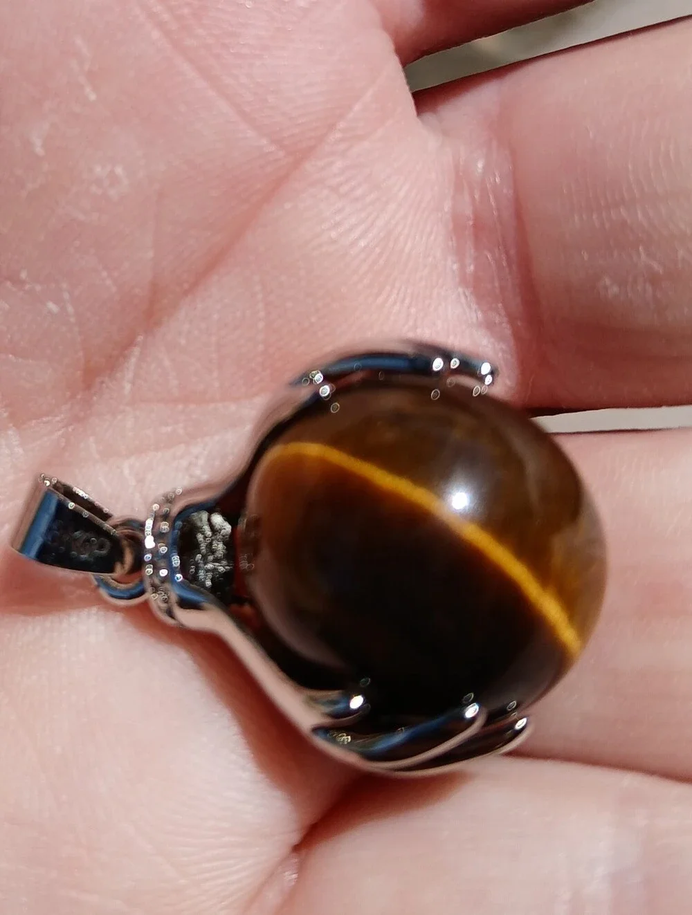 New 18K Hands Holding Tiger Eye Sphere Pendant.